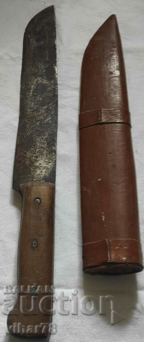 An old knife with a cane