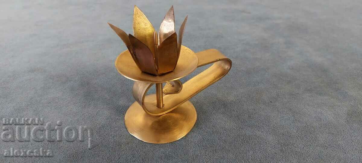 Auction An old brass candlestick Auction An old brass candlestick