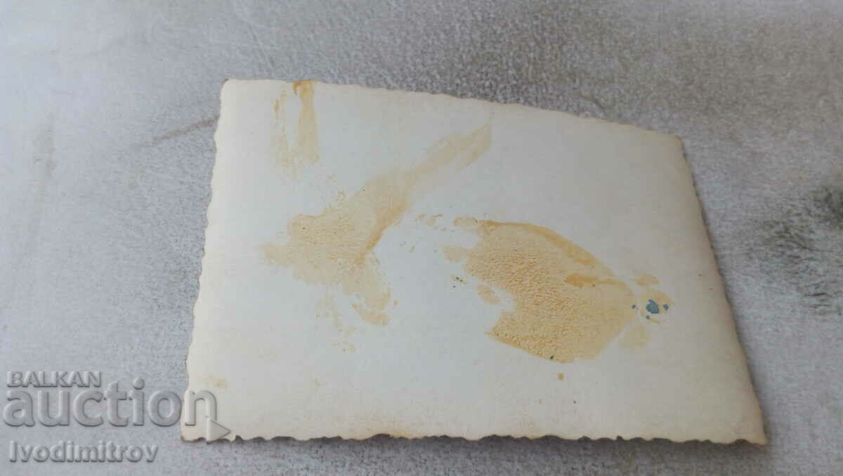 Photo Two men in front of a vintage truck on the road with price 2.65 BGN | € 1.35