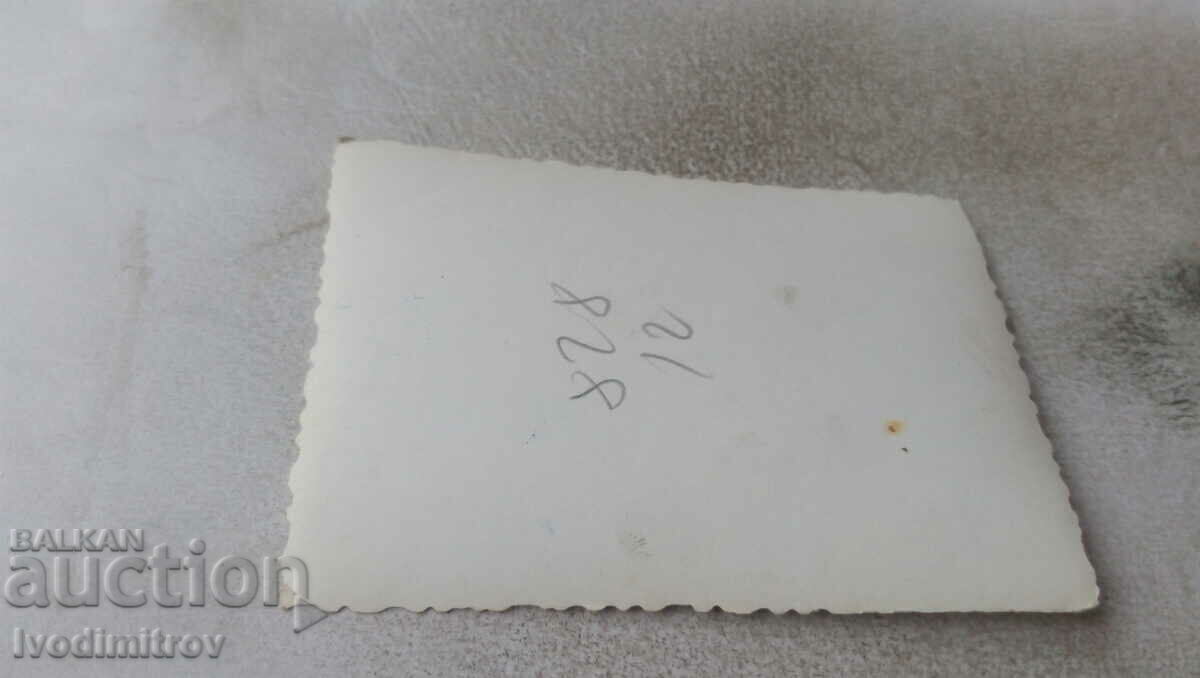 Photo A man and two women in front of a huge pile of snow in the park with price 0.75 BGN | € 0.38 Photo A man and two women in front of a huge pile of snow in the park with price 0.75 BGN | € 0.38