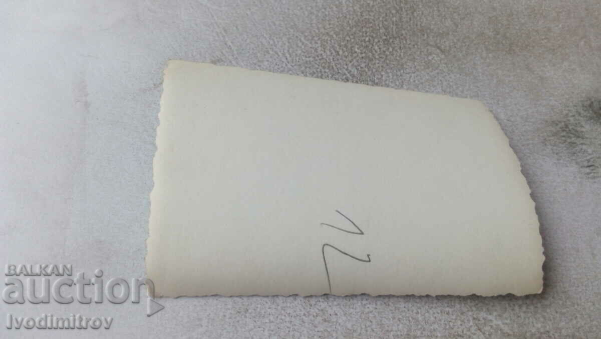 Photo Men and women around a table in the garden with price 0.85 BGN | € 0.43 Photo Men and women around a table in the garden with price 0.85 BGN | € 0.43