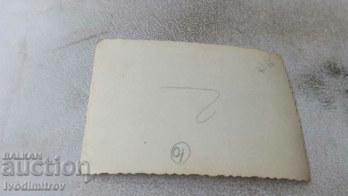 Photo Men and women on the street with price 0.75 BGN | € 0.38 Photo Men and women on the street with price 0.75 BGN | € 0.38