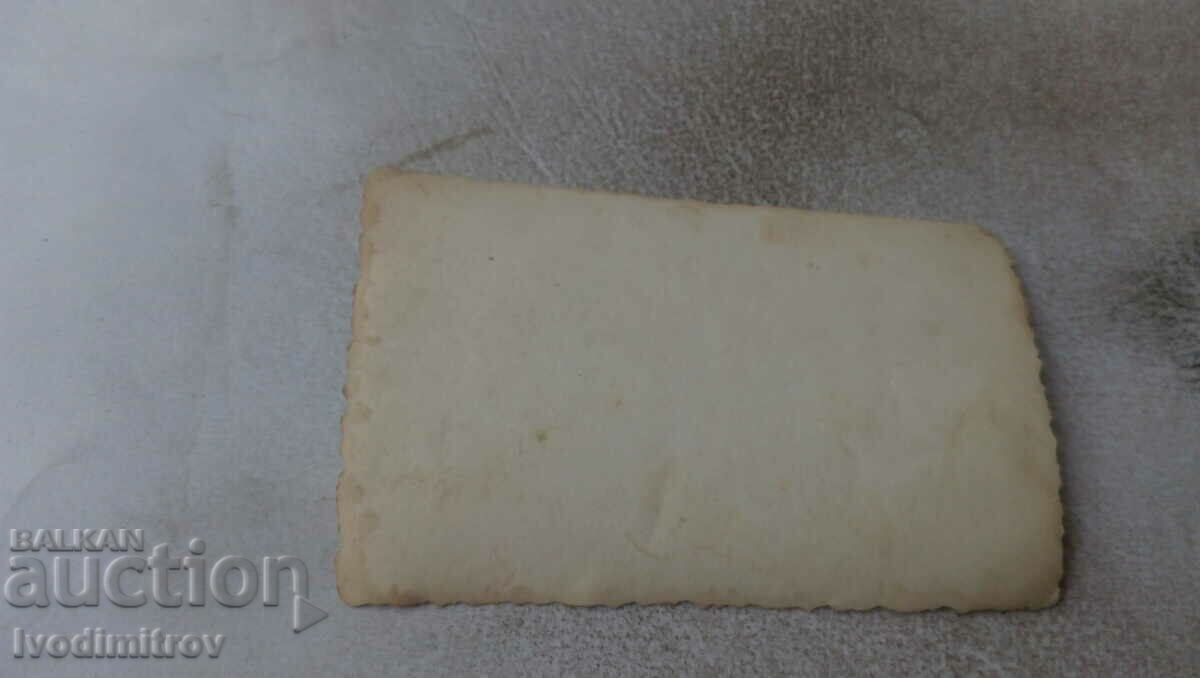 Photo Young men and women in front of a vintage truck with price 2.65 BGN | € 1.35 Photo Young men and women in front of a vintage truck with price 2.65 BGN | € 1.35