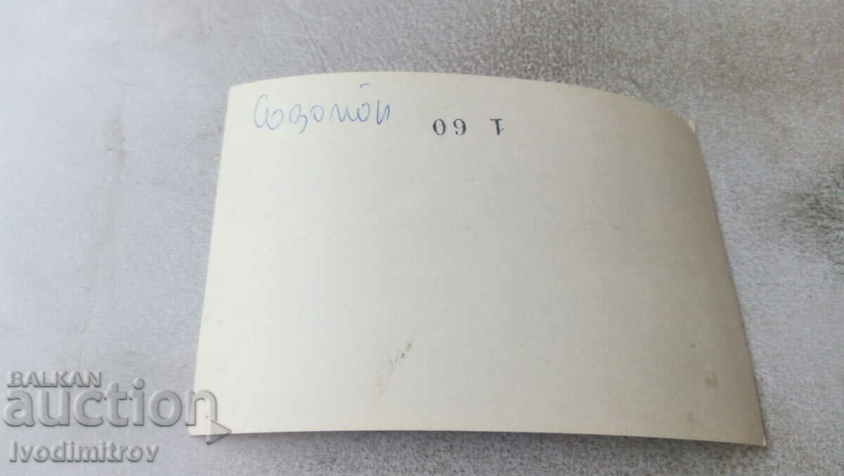 Photo Sozopol Young woman on a rock by the sea with price 0.75 BGN | € 0.38