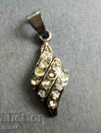 Old pendant with stones