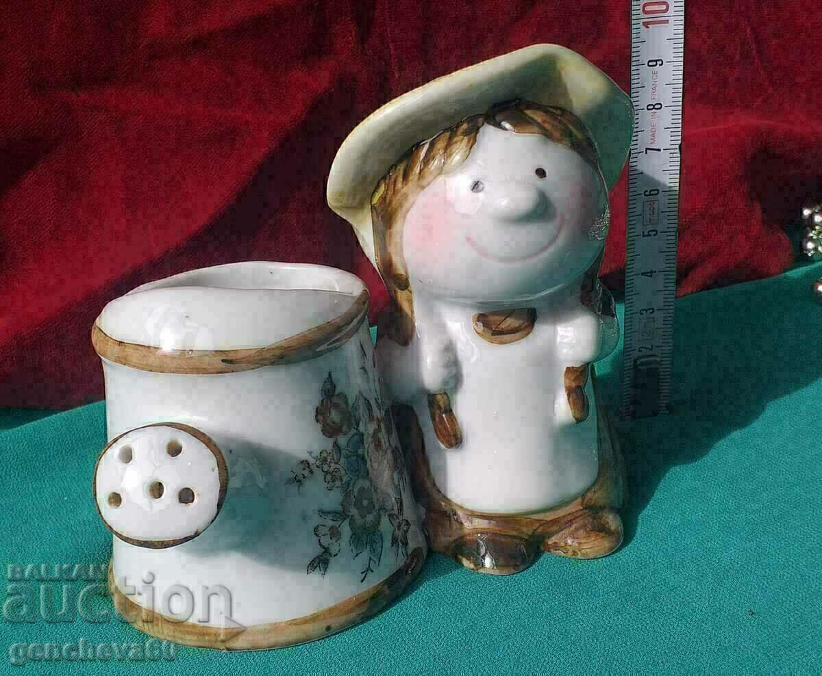 PORCELAIN Figure of a Girl with a watering can PORCELAIN Figure of a Girl with a watering can