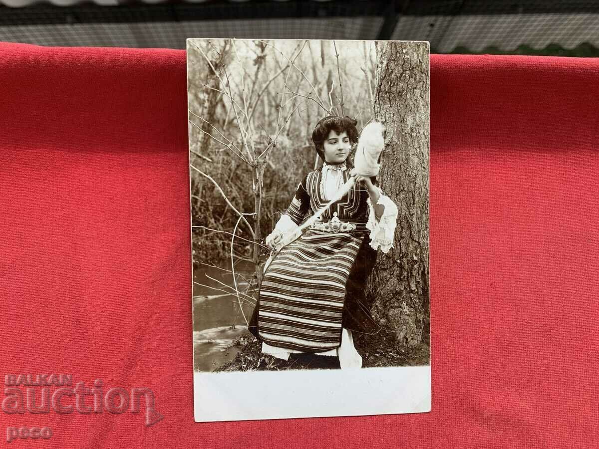 A beautiful Bulgarian woman in a Kyustendil costume before wearing a hurka, 1906. - 5