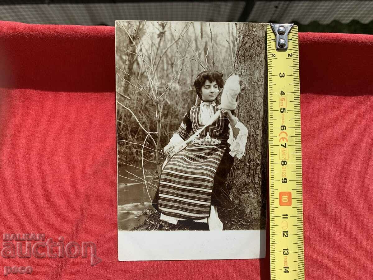 A beautiful Bulgarian woman in a Kyustendil costume before wearing a hurka, 1906. - 6