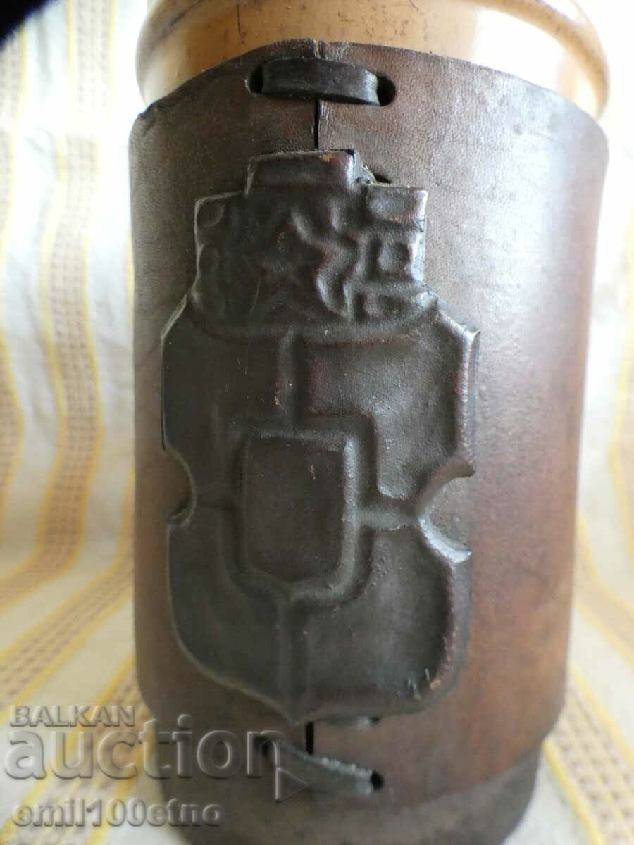 Delivery of Ceramic mug with leather cover and metal coat of arms of Sofia Delivery of Ceramic mug with leather cover and metal coat of arms of Sofia