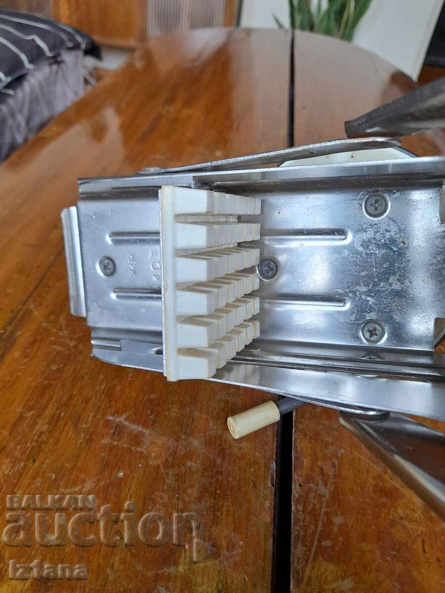 Delivery of Old kitchen appliance for cutting potatoes Delivery of Old kitchen appliance for cutting potatoes