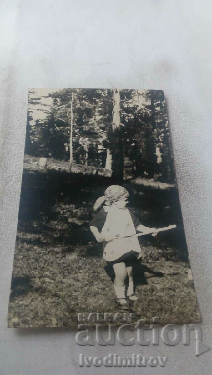 Mrs. Byala church Little boy holding a wooden stick 1930