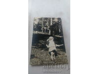 Mrs. Byala church Little boy holding a wooden stick 1930