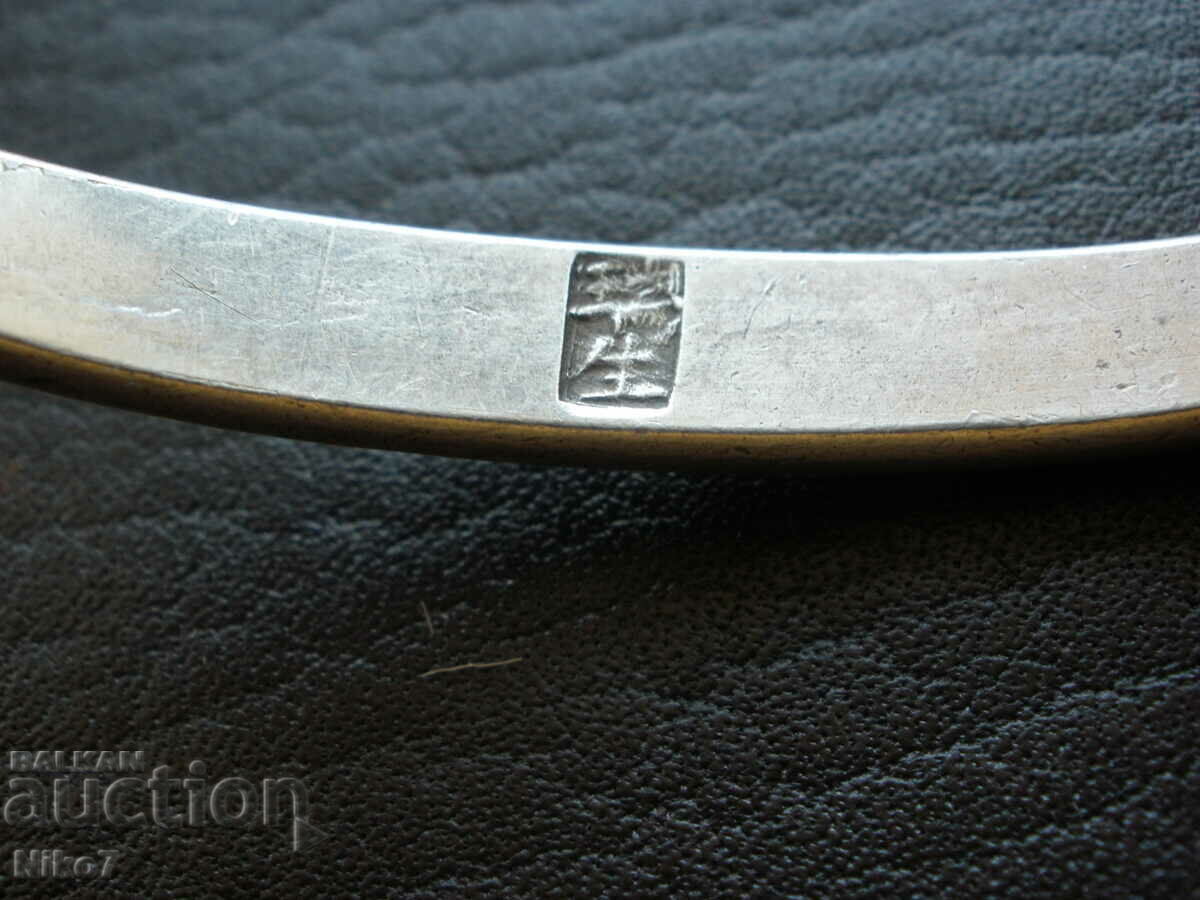 Auction  Antique Chinese silver bracelet.