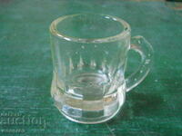 a small glass cup