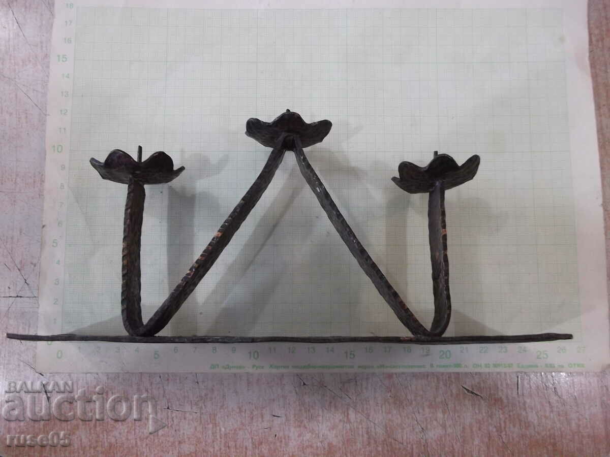 Auction Candlestick for three candles of wrought copper from Sotsa Auction Candlestick for three candles of wrought copper from Sotsa