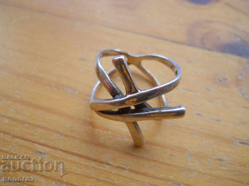 Antique silver ring with abstract design