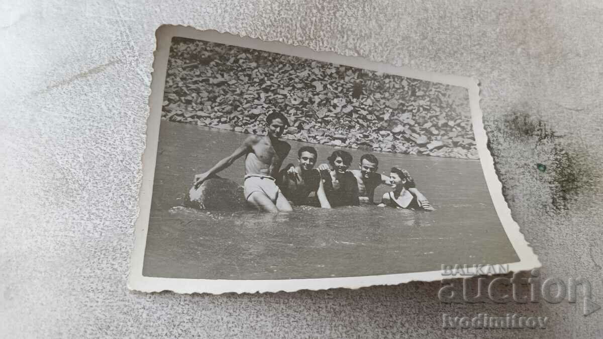 Mrs. Lakatnik Two young men and two girls in the river Iskar 1951
