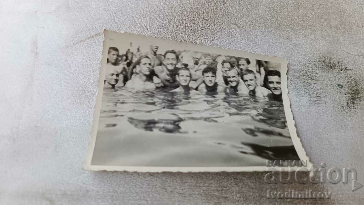 Photo Men in the water