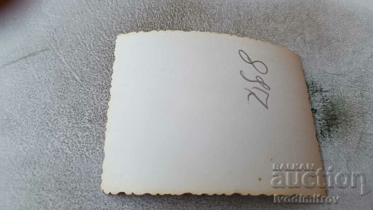 Photo Three young men in front of a store on the sidewalk with price 1.65 BGN | € 0.84 Photo Three young men in front of a store on the sidewalk with price 1.65 BGN | € 0.84