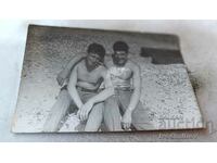 Photo Two young men naked to the waist