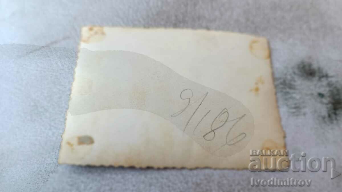 Photo Sofia A man, a woman and a little boy on the sidewalk with price 2.65 BGN | € 1.35 Photo Sofia A man, a woman and a little boy on the sidewalk with price 2.65 BGN | € 1.35