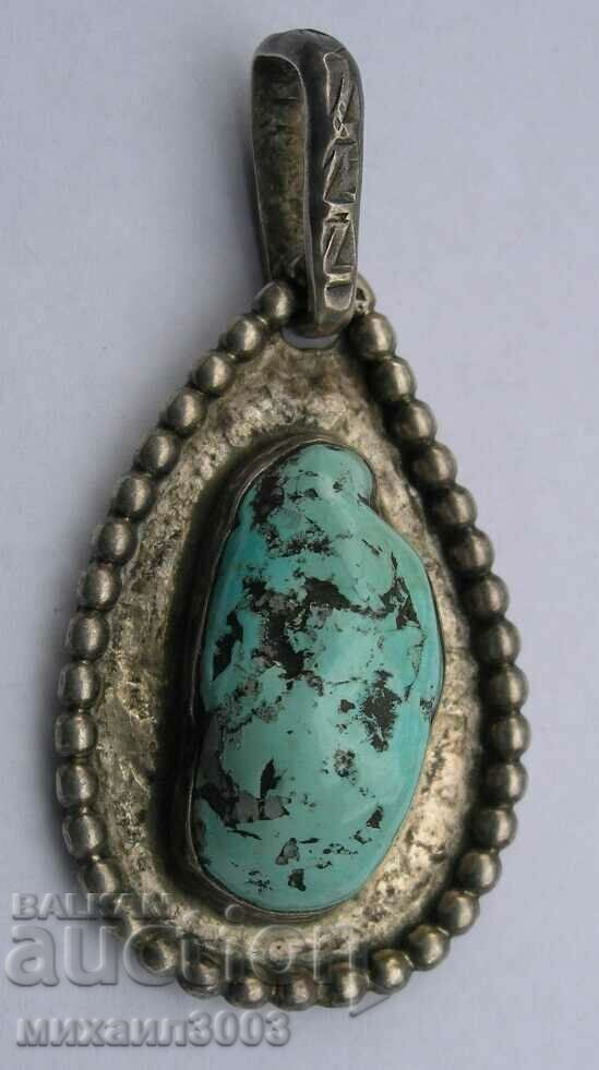 Exotic silver locket with turquoise