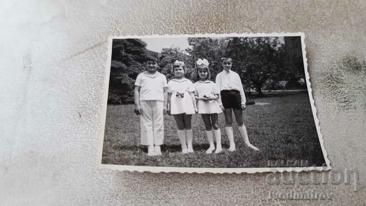 Photo Four children in the park