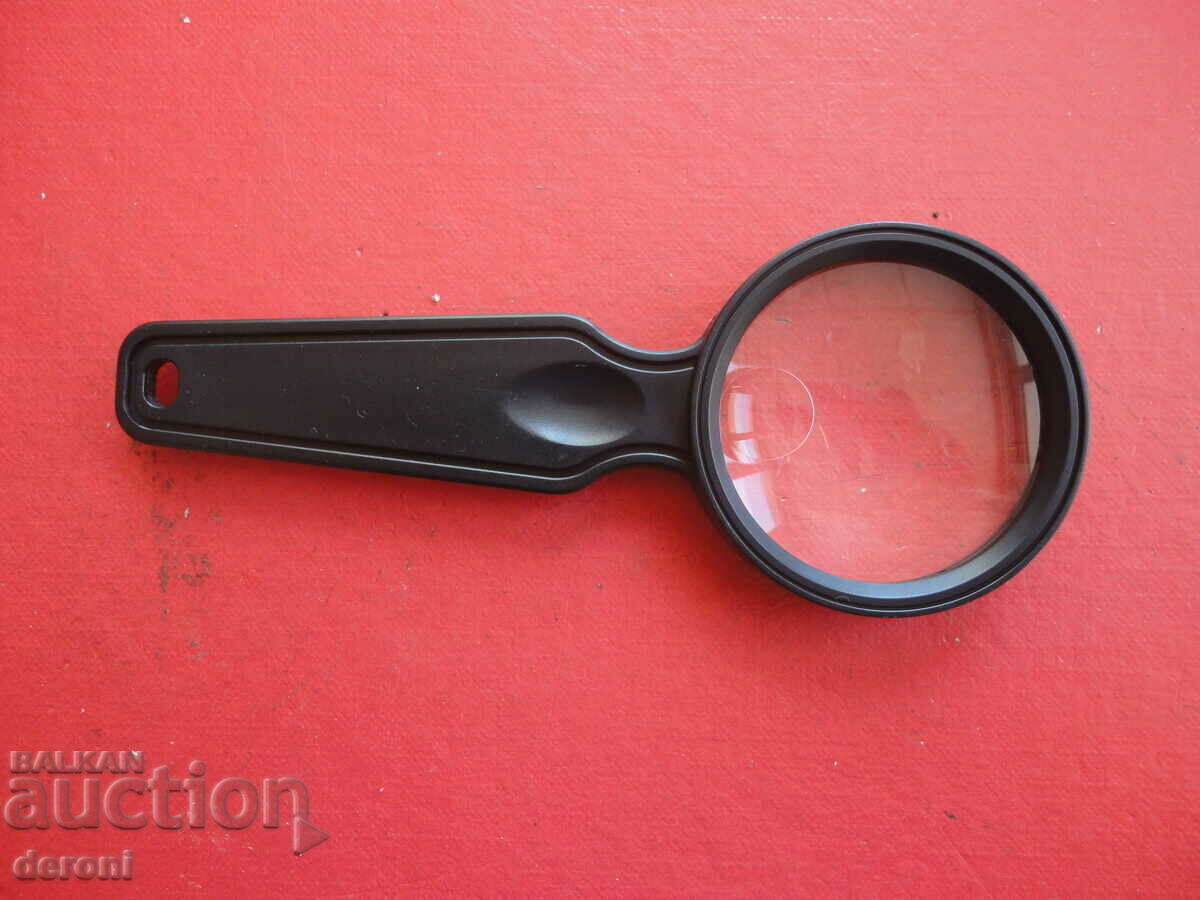 Delivery of Old magnifying glass Delivery of Old magnifying glass