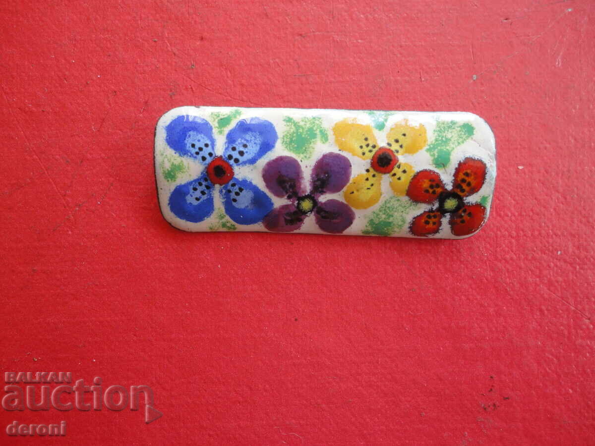 Auction A great enamel brooch Auction A great enamel brooch