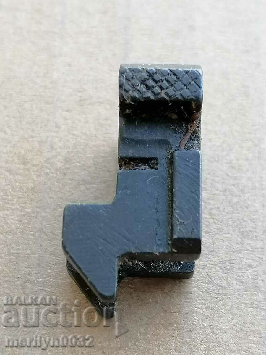 Auction Part, detail for a bayonet knife on an AK-47 button Auction Part, detail for a bayonet knife on an AK-47 button