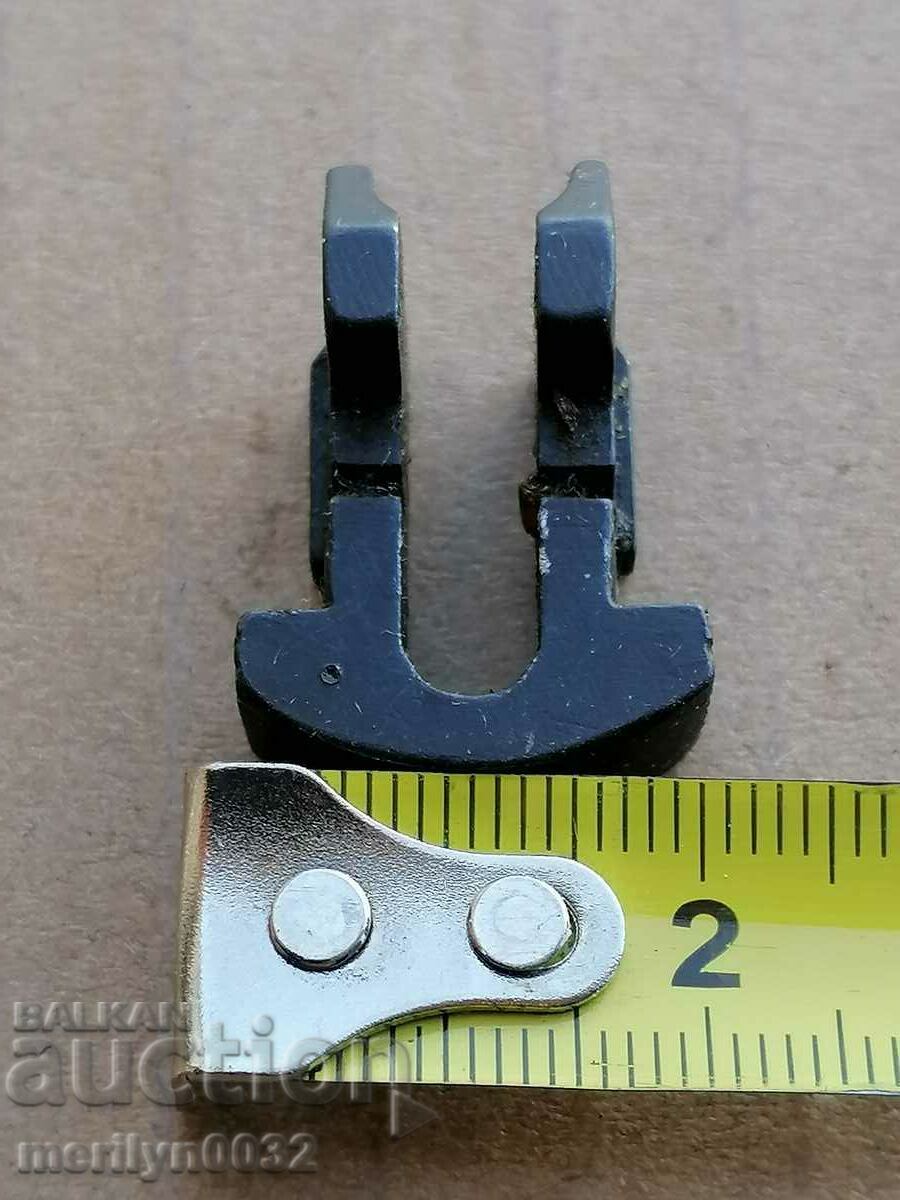 Part, detail for a bayonet knife on an AK-47 button - 6 Part, detail for a bayonet knife on an AK-47 button - 6