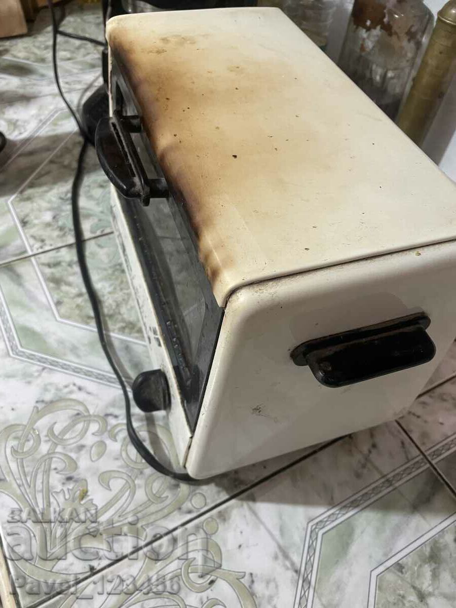 Delivery of old working sandwich oven Delivery of old working sandwich oven