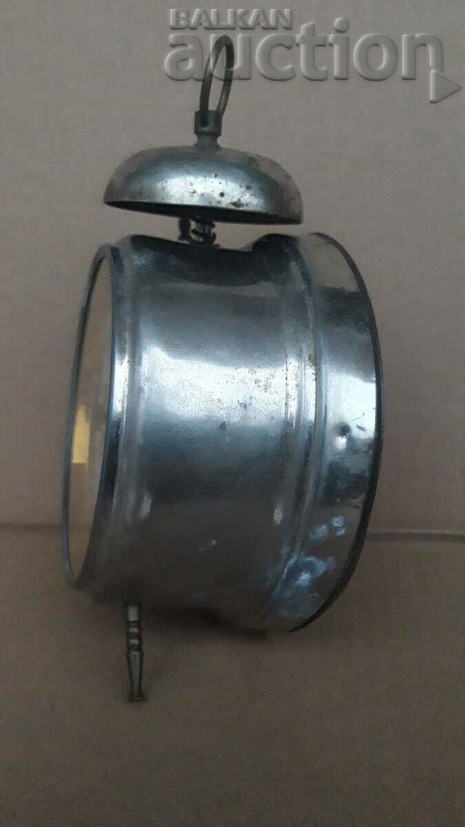 Delivery of Early 20th century alarm clock Delivery of Early 20th century alarm clock