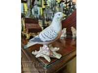 A lovely antique porcelain figure statuette