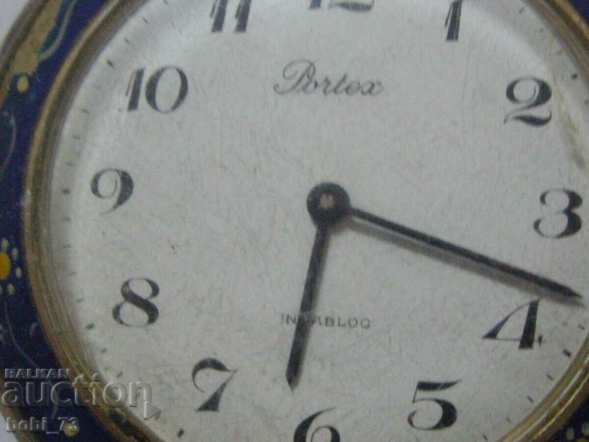 Auction Old pocket watch with colored enamel. Auction Old pocket watch with colored enamel.