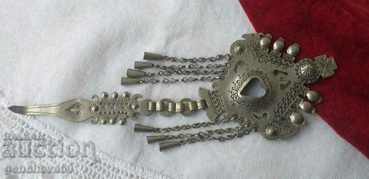 Old fashioned hairpin, needle, amulet