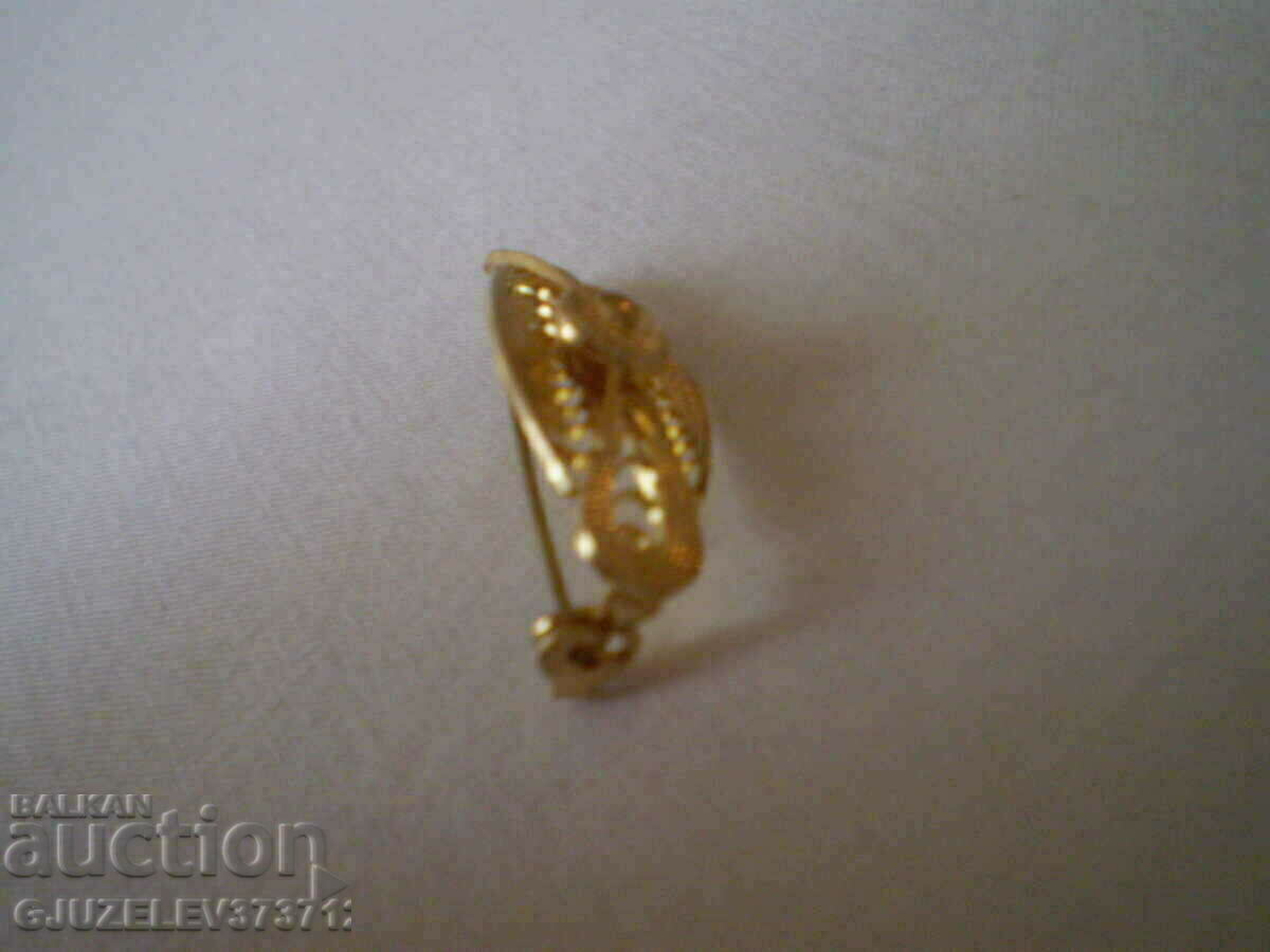 Delivery of Old brooch with gilding, filigree Delivery of Old brooch with gilding, filigree