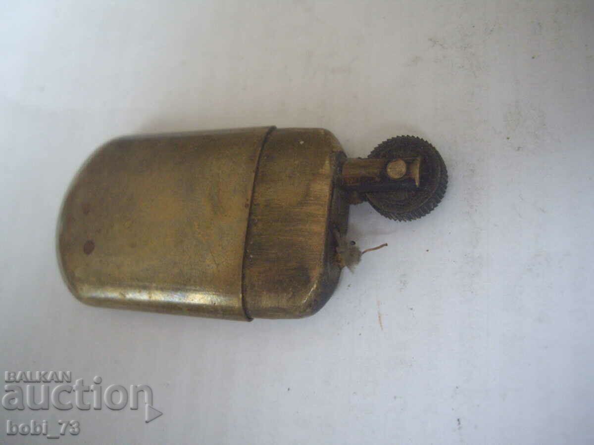 An old lighter. with price 30.00 BGN | € 15.34 An old lighter. with price 30.00 BGN | € 15.34