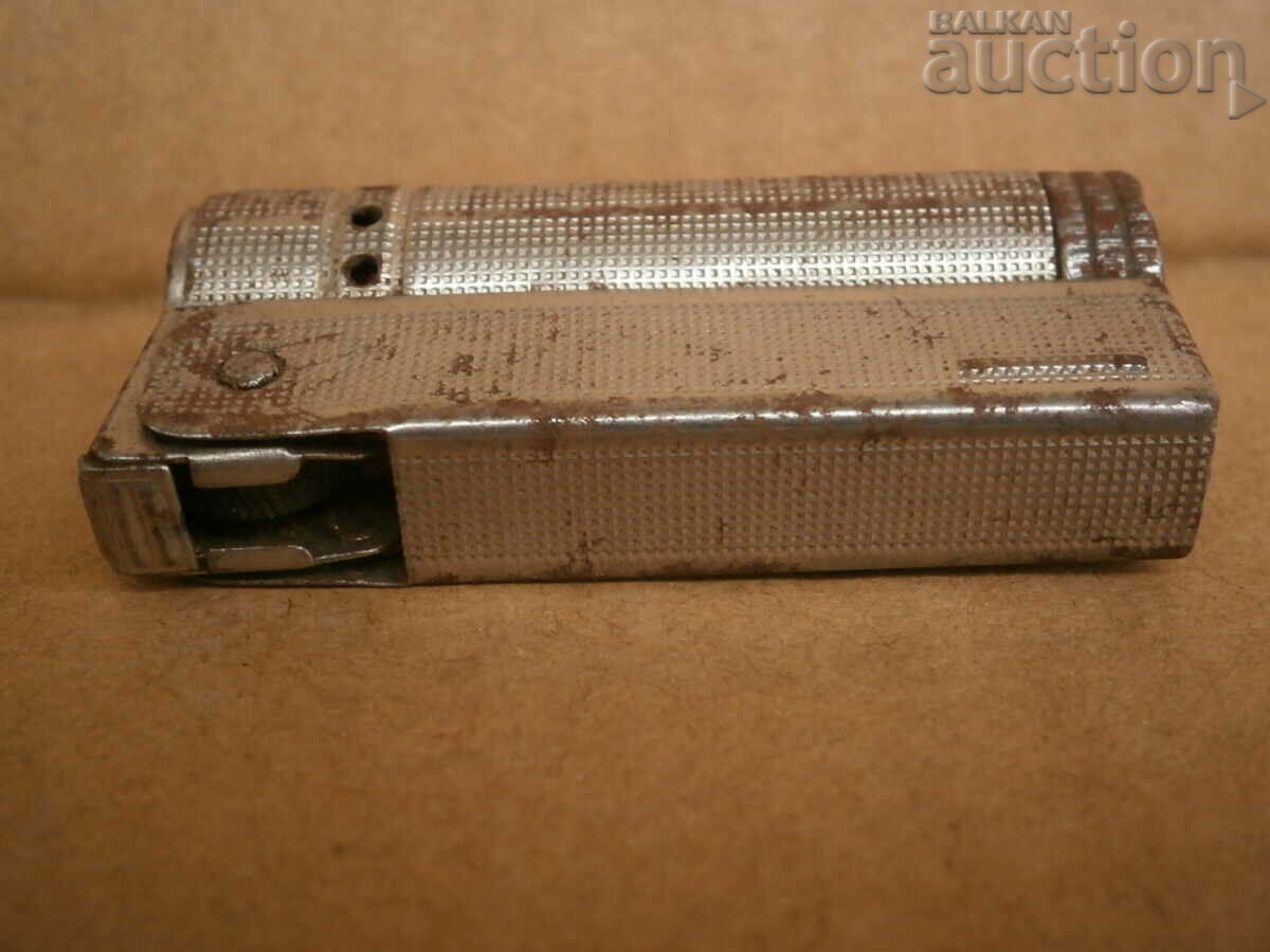 Auction vintage gasoline lighter Auction vintage gasoline lighter
