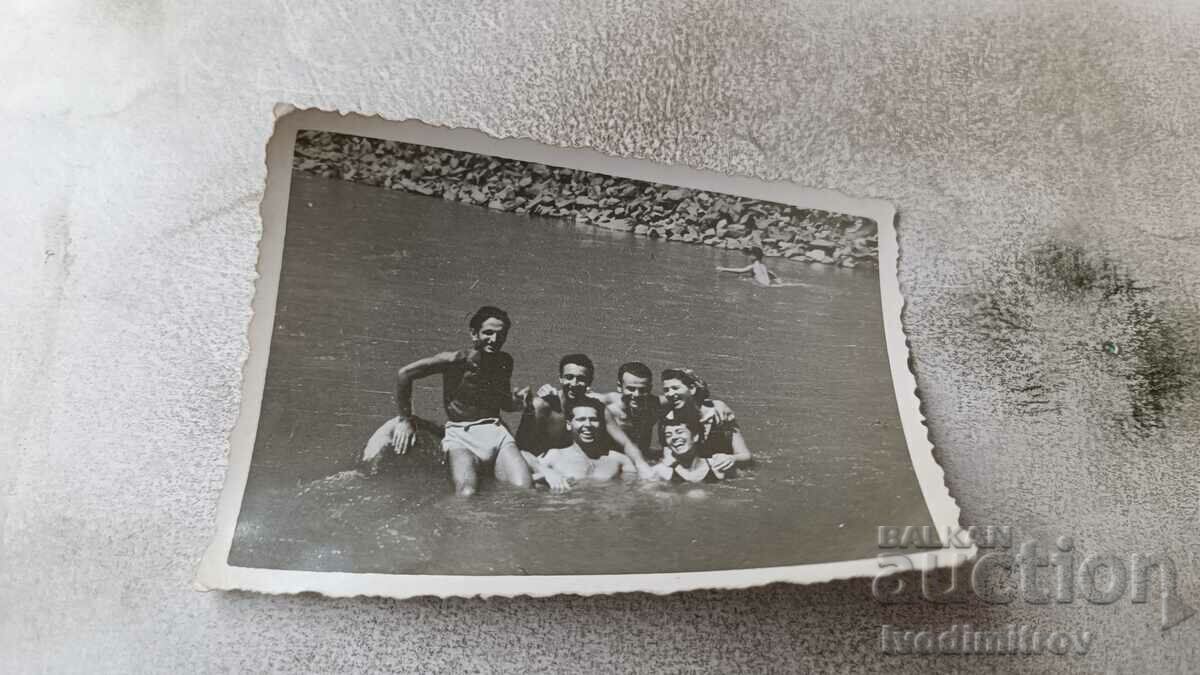 Ms. Lakatnik Young men and women on stones in the river Iskar 1951
