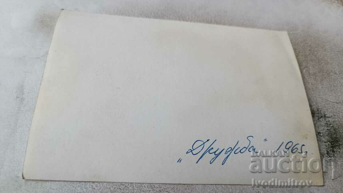 Photo Friendship Two men and a young girl on the beach with price 1.25 BGN | € 0.64