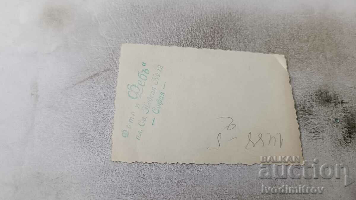 Photo Sofia A woman and a man with a baby on the sidewalk in winter with price 2.65 BGN | € 1.35 Photo Sofia A woman and a man with a baby on the sidewalk in winter with price 2.65 BGN | € 1.35