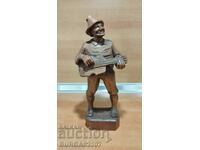 Old wooden figure, musician with guitar, 30 cm.