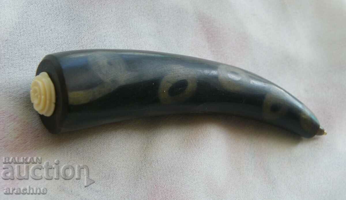 A rare African buffalo horn and ivory chemical