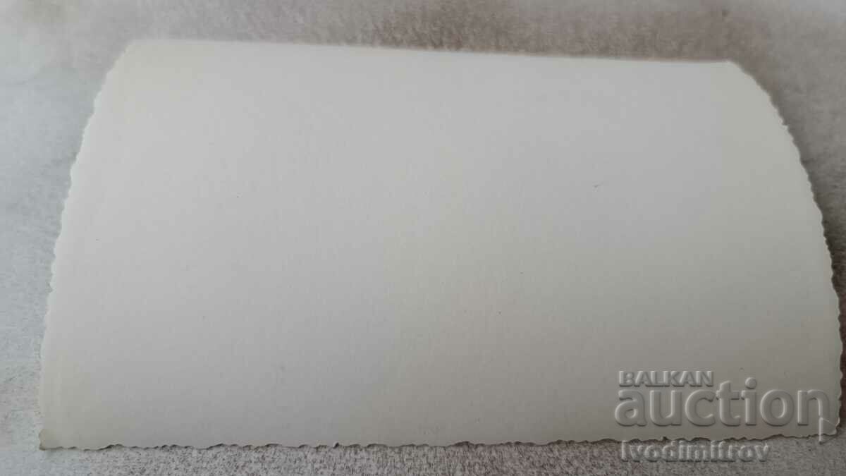 Photo Young girl in a swimsuit sitting on a stone wall with price 0.85 BGN | € 0.43 Photo Young girl in a swimsuit sitting on a stone wall with price 0.85 BGN | € 0.43