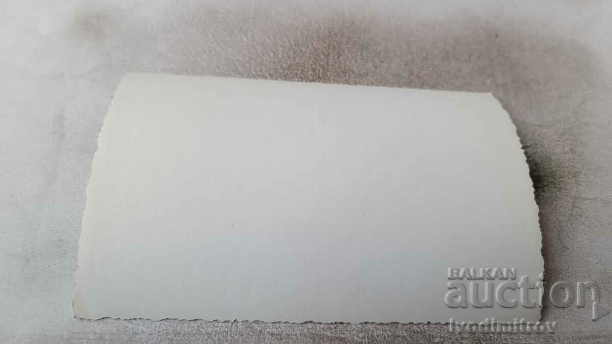 Photo Young girl in a swimsuit sitting on a stone wall with price 0.85 BGN | € 0.43 Photo Young girl in a swimsuit sitting on a stone wall with price 0.85 BGN | € 0.43