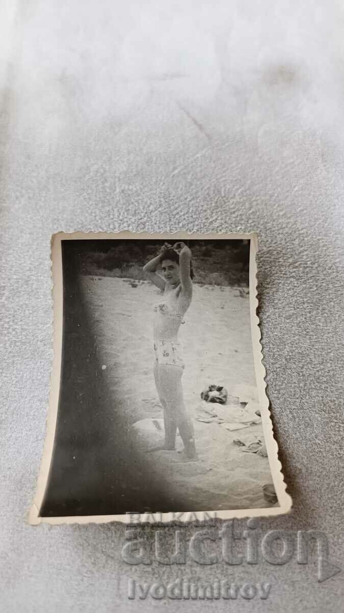 Φωτογραφία Νεαρό κορίτσι στην παραλία