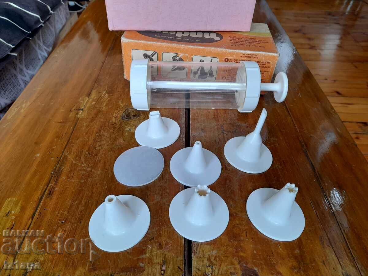 Auction An old pastry syringe Auction An old pastry syringe