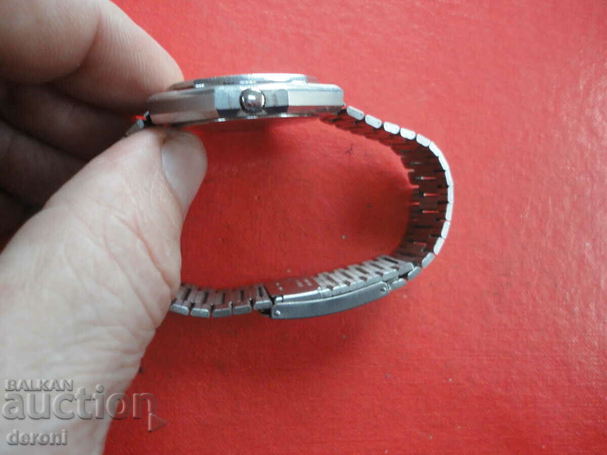 Auction  A great Dugena Gamma watch