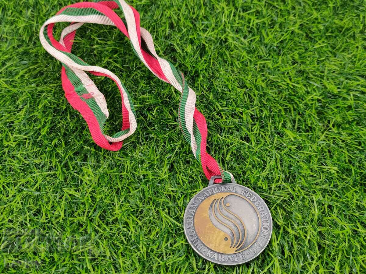 Delivery of Silver medal Karate 1997 Delivery of Silver medal Karate 1997